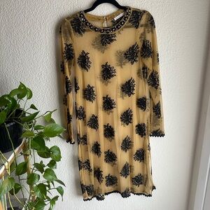 Elegant Black and Gold Sheer Dress